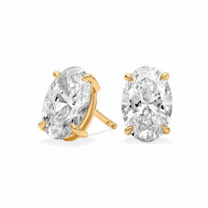 Aretes SIA en oro amarillo sobre fondo blanco